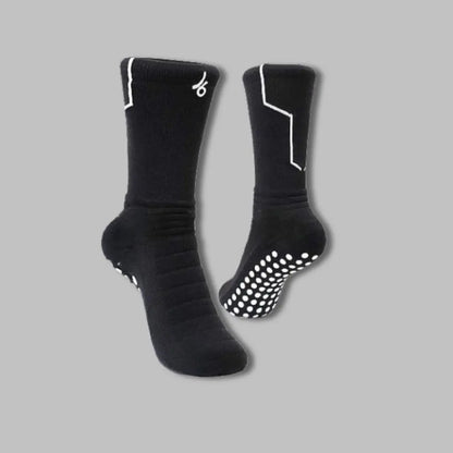Chaussettes antidérapantes noirs Joga avec grip blanc